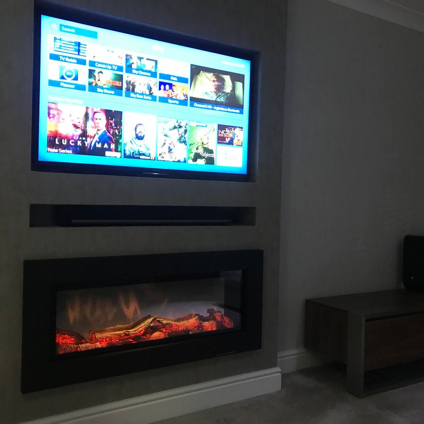 Television above fireplace