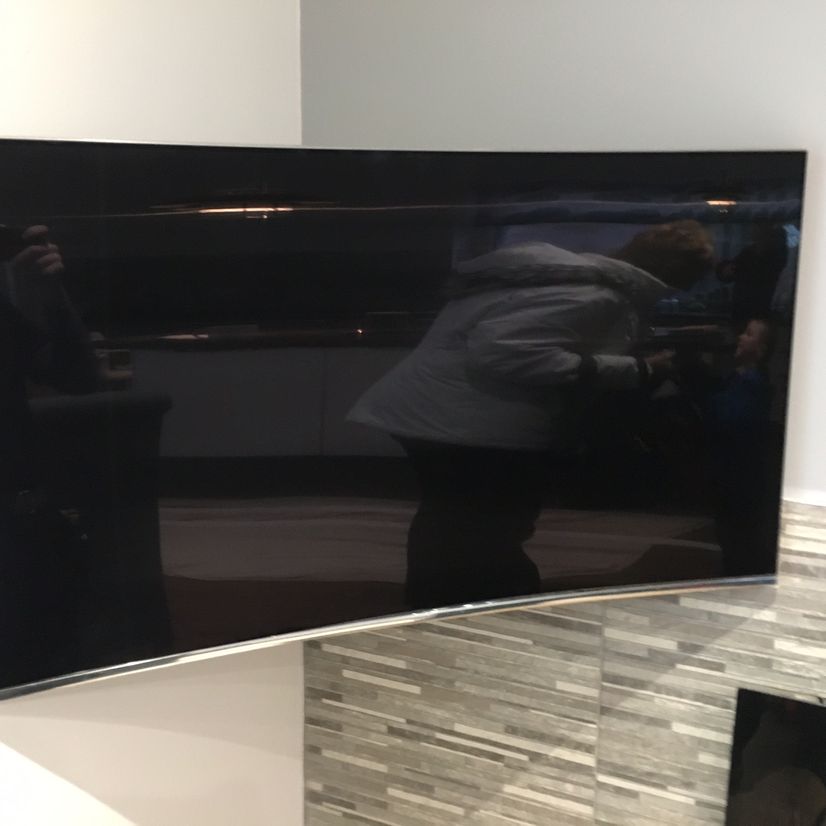 Wall mounted tv in the corner